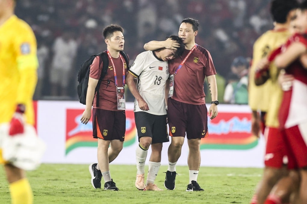 China’s Hu Hetao (centre) reacts after his team’s loss to Indonesia in a 2026 Fifa World Cup Asian qualifier in Jakarta early last month. Photo: Xinhua