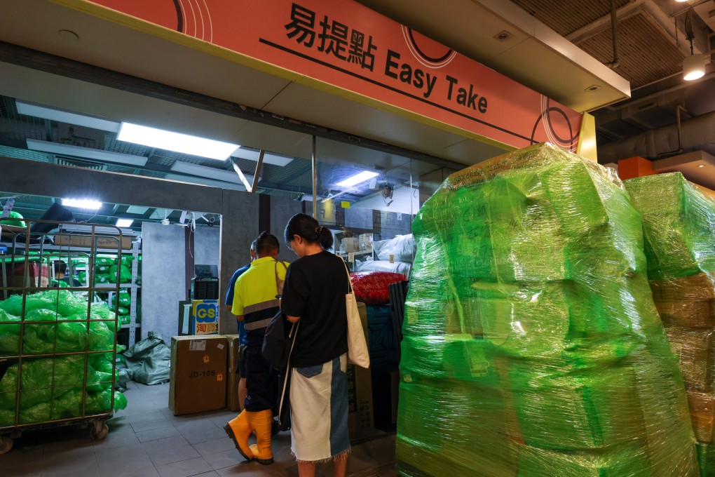 People retrieving parcels from a pick-up shop. Photo: Jelly Tse