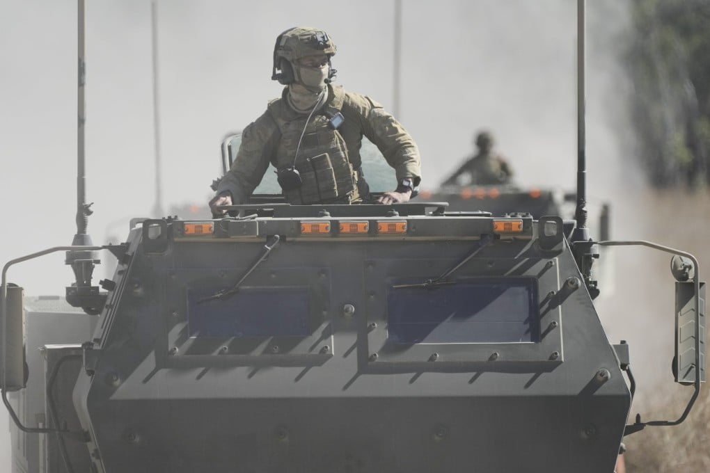 Australian troops drive multiple launch rocket systems for test-firing at Shoalwater Bay Training Area near Rockhampton last week during Talisman Sabre 2025. Photo: AP