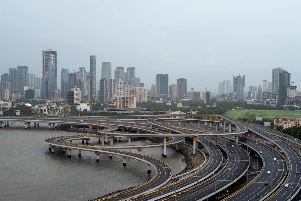 Vehicles drive on the costal roads in India’s financial capital Mumbai on July 6. By considering a partial rollback of its foreign investment screening, India aims to restore investor confidence without fully abandoning its caution towards China. Photo: AFP