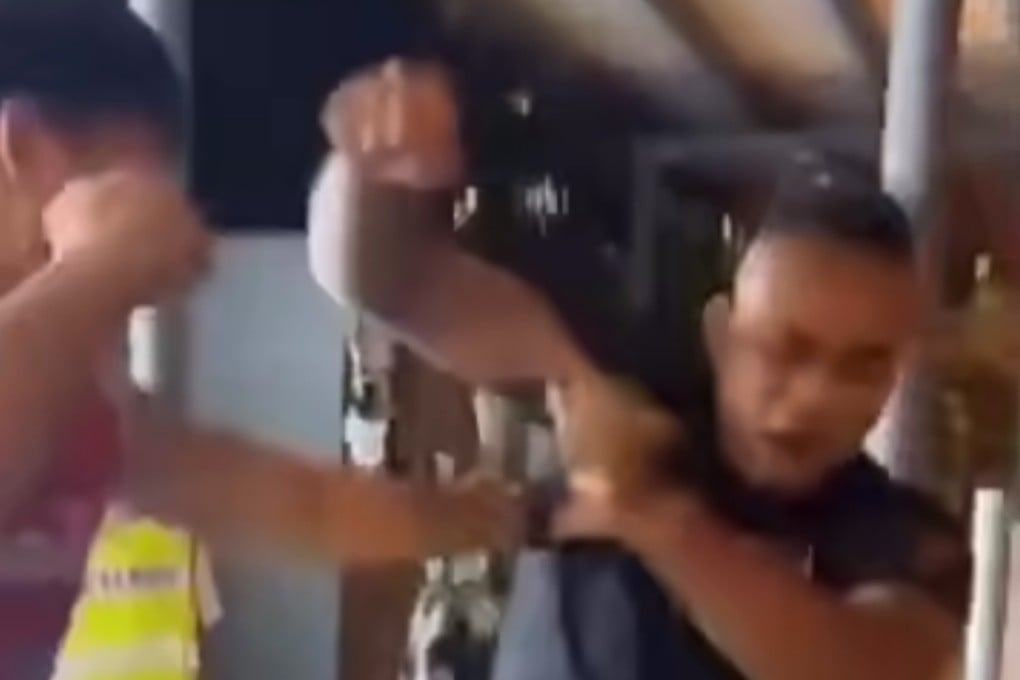 Muhammad Alim Muhamad Adnizam (right) challenging MMA coach Tony Lim to a fight. Alim had to get stitches after being knocked out. Photo: handout