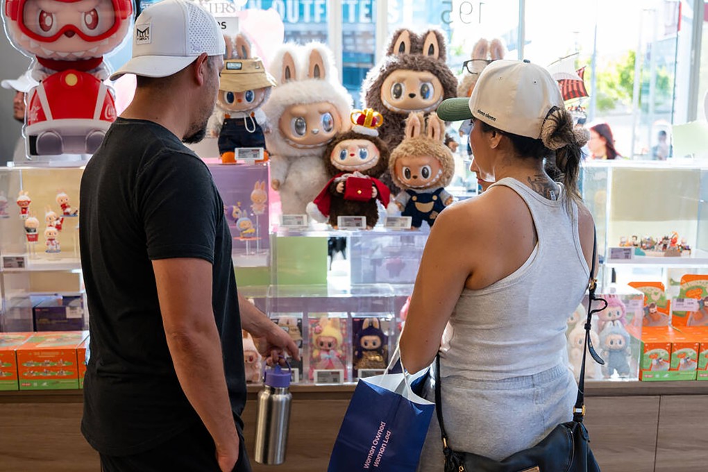 Customers look at Labubu dolls on display in a Pop Mart store in Las Vegas July 12, 2025. Photo: Las Vegas Review-Journal/TNS