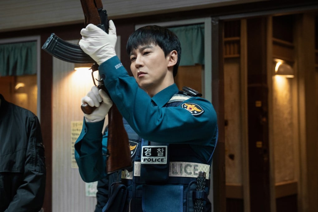 Kim Nam-gil as Lee Do, an empathetic police officer who talks people out of committing gun crimes, in a still from Trigger. Photo: Netflix