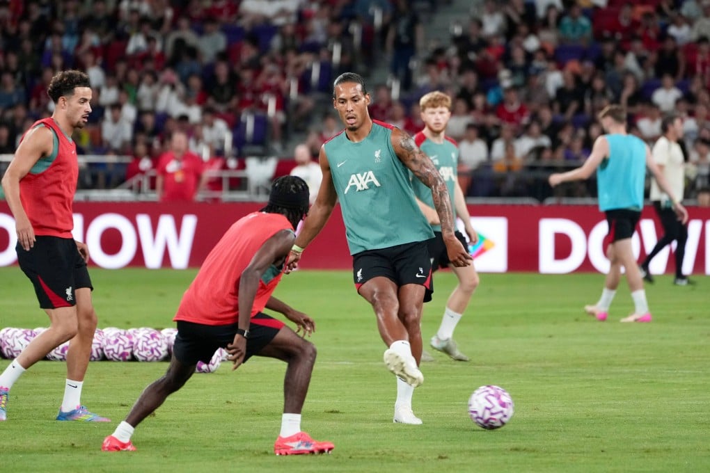 Liverpool captain Virgil van Dijk (middle) was not entirely happy with the condition of the Kai Tak Stadium pitch. Photo: Sam Tsang