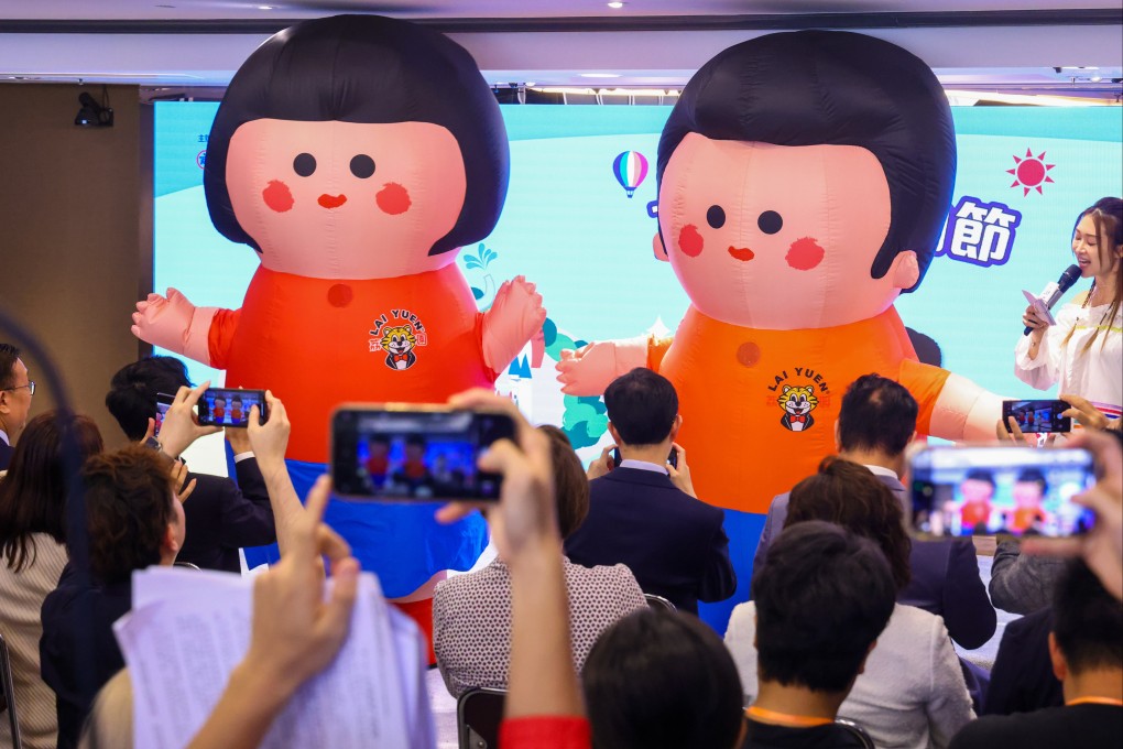 Lai Yuen Amusement Park mascots on show at a press briefing for the shopping festival. Photo: Dickson Lee