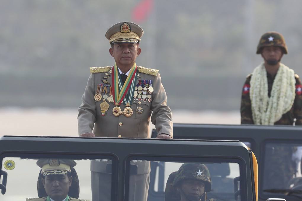 Myanmar’s junta chief Min Aung Hlaing inspects a military parade in Naypyidaw in 2023. Photo: AP