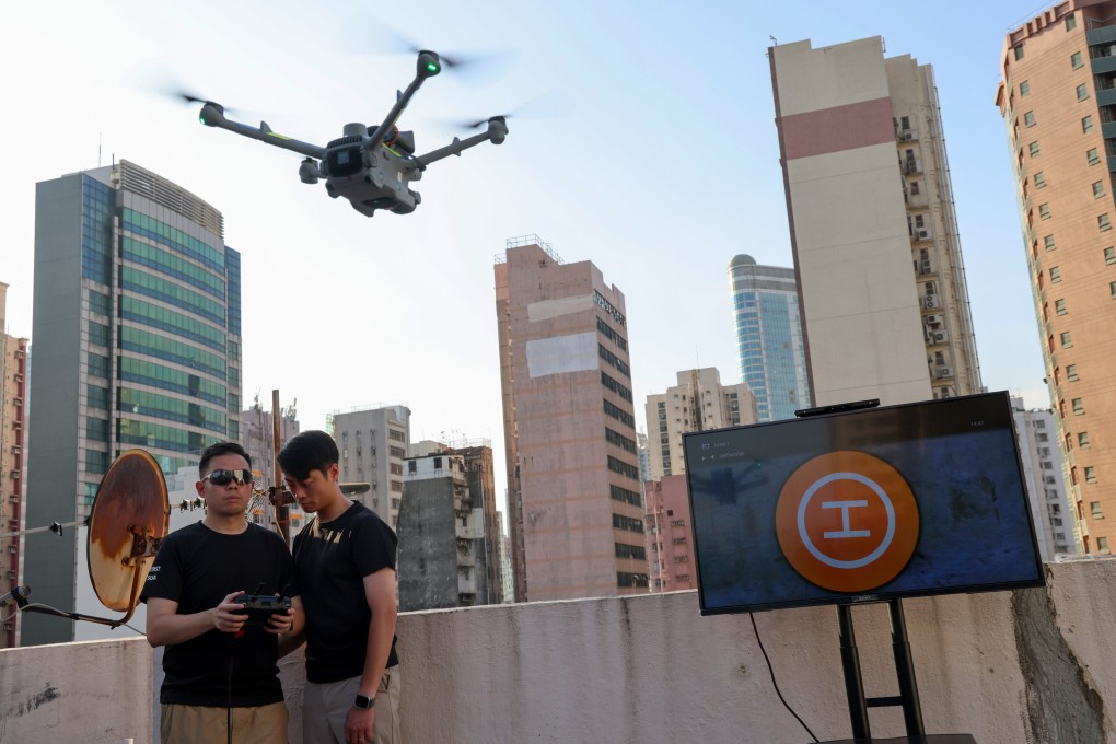 Police officers demonstrate manoeuvring a drone for patrols in Hong Kong’s Yau Ma Tei area on June 6. Photo: Jelly Tse