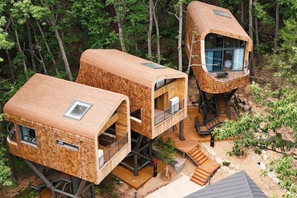 The three tree houses at Surak Hyu in Seoul, South Korea, are each perched on a steel frame 12 to 14 metres above the ground, giving the impression of floating among the trees. Photo: Instagram/paragonstar_