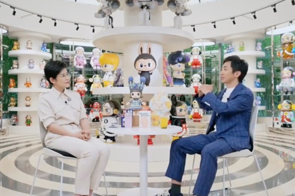 Pop Mart founder and CEO Wang Ning (right) is interviewed by China Central Television on Thursday. Photo: CCTV