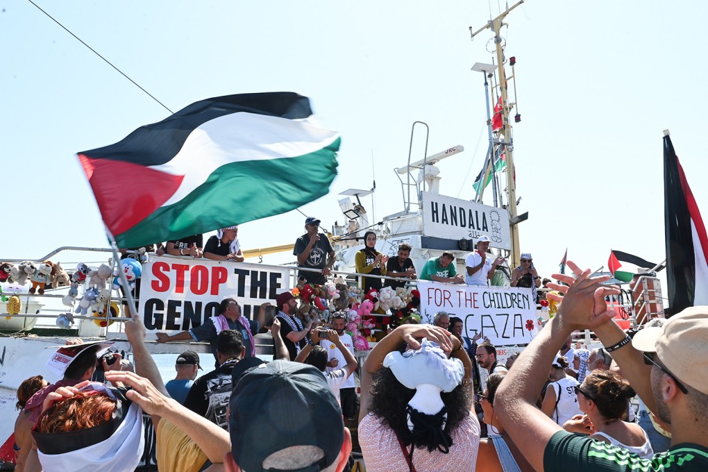 Pro-Palestine supporters wave and cheer for the Freedom Flotilla Coalition ship Handala as it departs for Gaza, on July 20. Photo: dpa