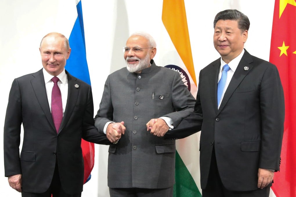 Russian President Vladimir Putin, Indian Prime Minister Narendra Modi and Chinese President Xi Jinping hold a meeting on the sidelines of a G20 summit in 2019. Photo: Sputnik / AFP