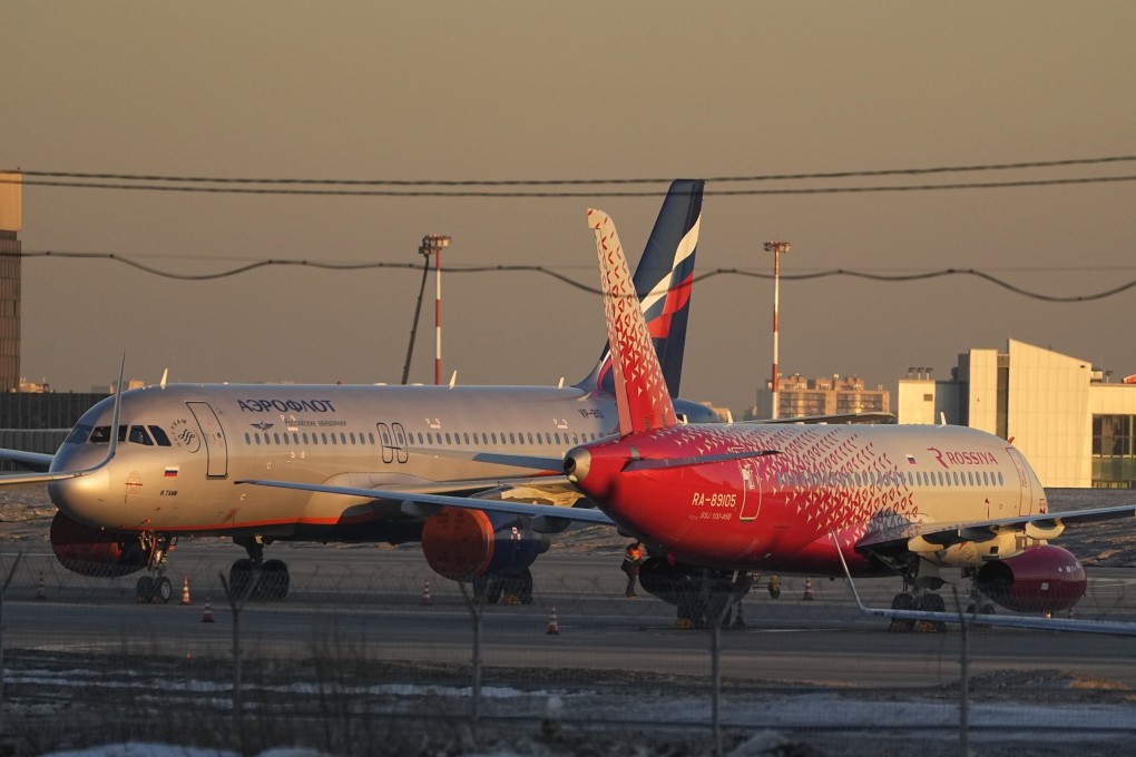 Aeroflot’s passengers planes are parked at Sheremetyevo airport, outside Moscow, Russia. The airline has been forced to cancel flights after a massive cyberattack. Photo: AP