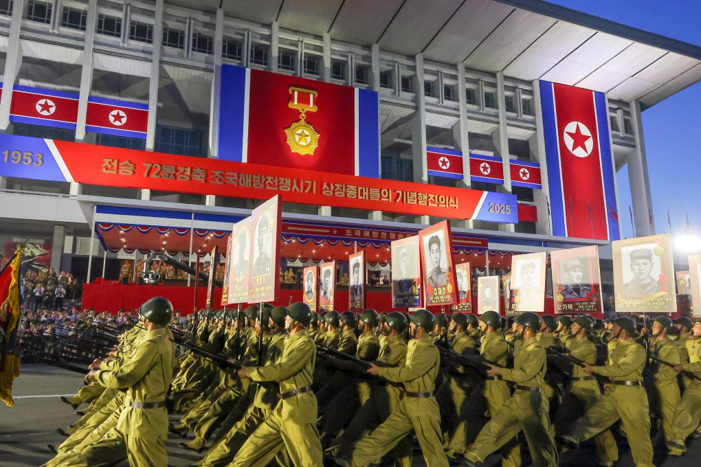North Korean troops march in a parade commemorating the Korean War armistice in Pyongyang on Sunday. Photo: Korean Central News Agency/Reuters