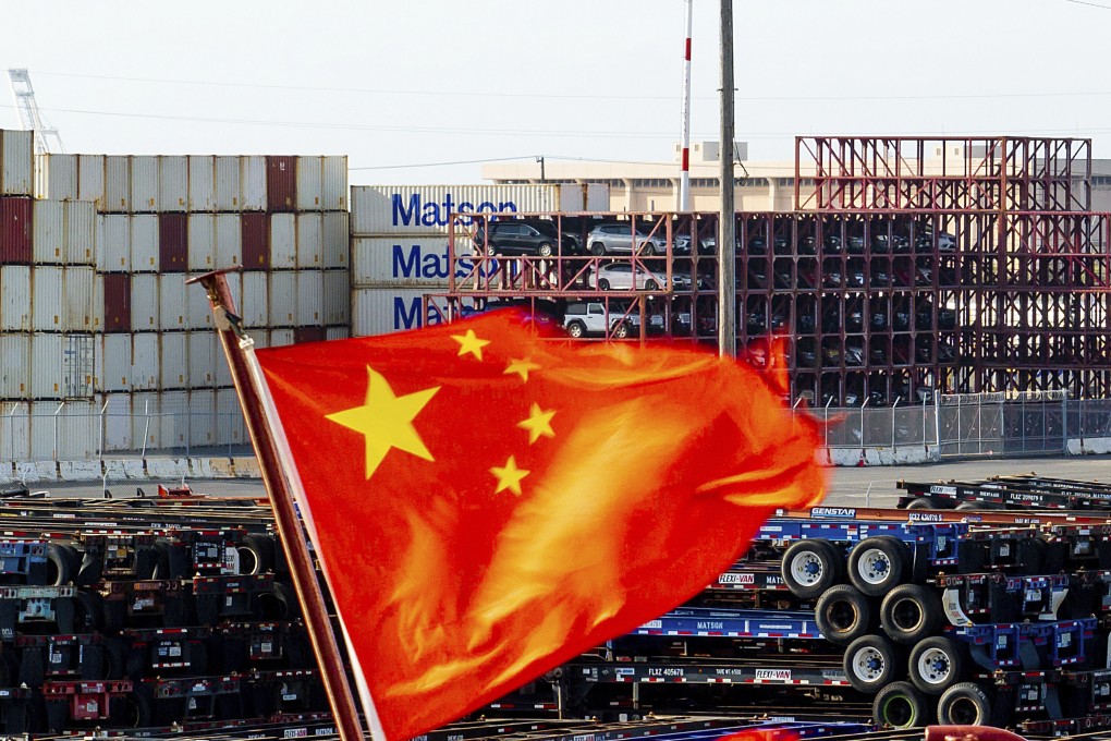 A Chinese flag flies from a ship at the Port of Oakland in California. Officials from the United States and China are beginning a third round of trade negotiations in Stockholm on Monday as both sides strive to bring their ongoing tariff war to an end. Photo: AP