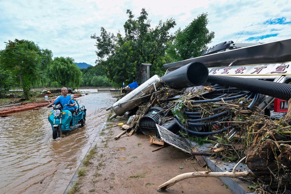 Swathes of northern China including Beijing have been lashed by torrential downpours. Photo: AFP