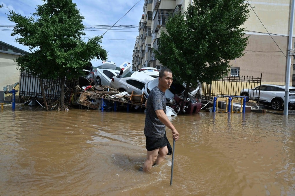 Beijing’s Miyun district saw almost a year’s average rainfall in the space of a few days. Photo: AFP