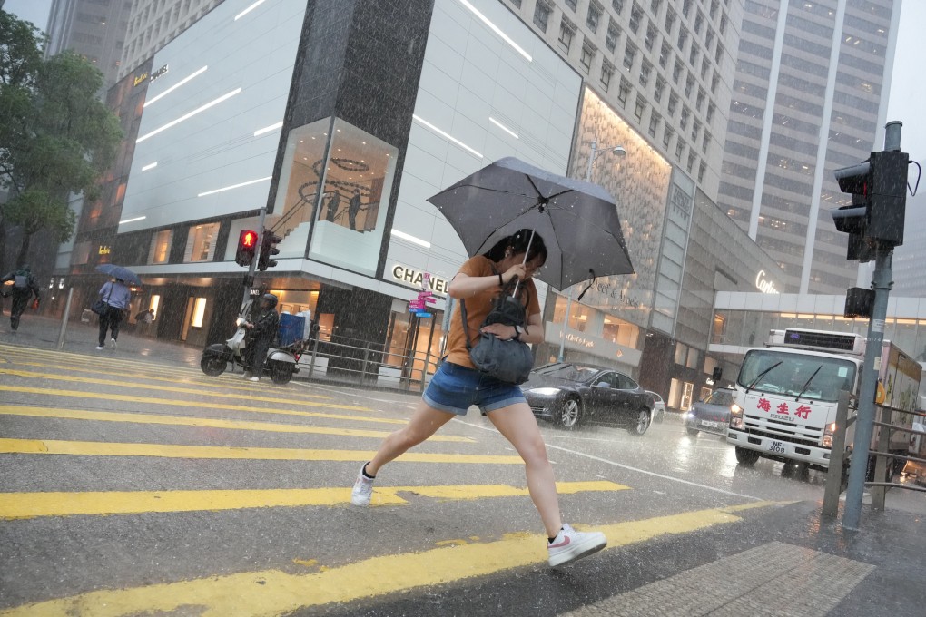 Some areas were hit with more than 100mm of rainfall in an hour, and many Hongkongers were caught in the deluge on their way to work. Photo: May Tse