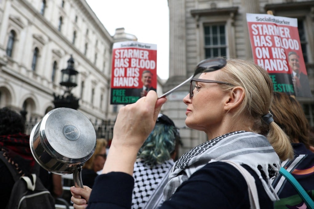 Pro-Palestinian demonstrators outside Downing Street in London as Prime Minister Keir Starmer announced Britain will recognise the state of Palestine in September unless the Israeli government commits to a peace process. Photo: Reuters