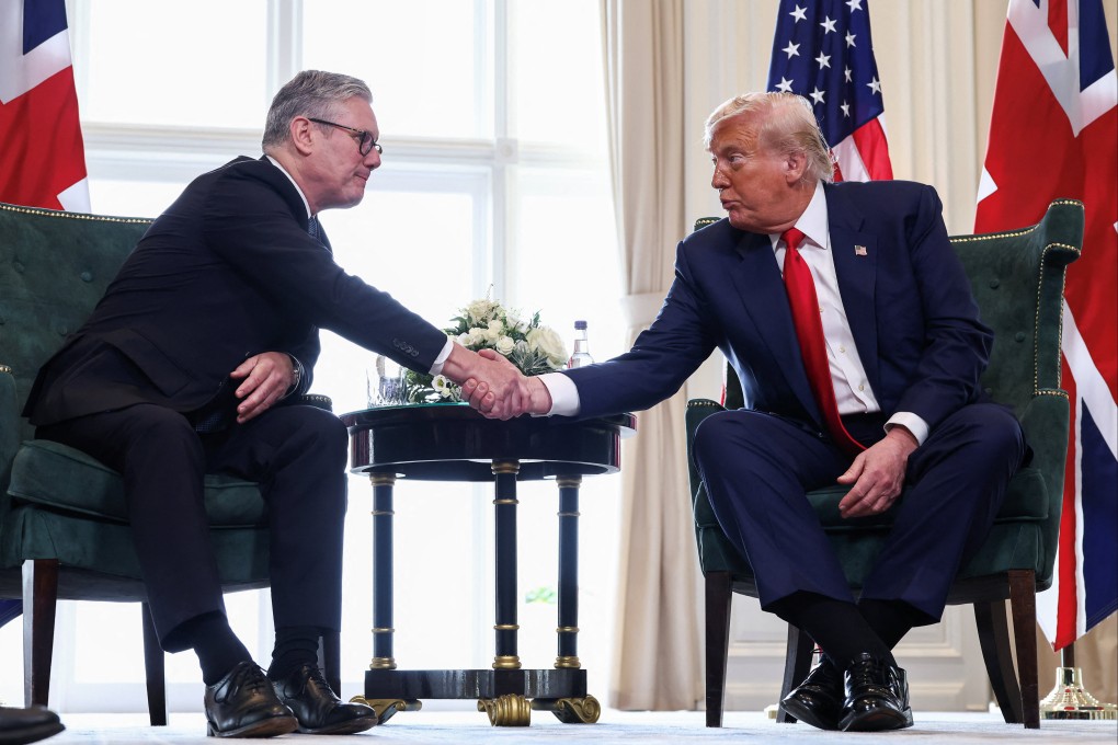US President Donald Trump, right, and British Prime Minister Keir Starmer shake hands, during a bilateral meeting at Trump’s Turnberry golf resort in Ayrshire, Scotland on Monday. Photo: Reuters