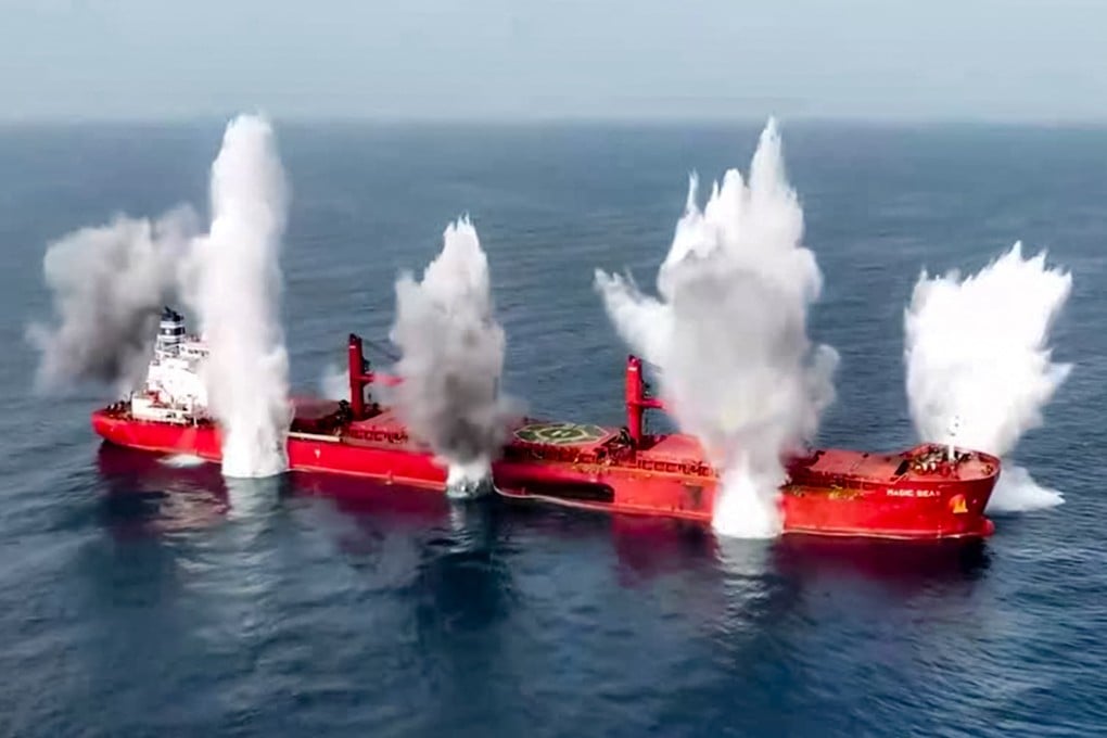 Plumes of smoke rise from reported explosions on the Liberia-flagged bulk carrier Magic Seas, which was attacked by Houthi-affiliated fighters this month. Photo: Ansarullah Media Centre/AFP