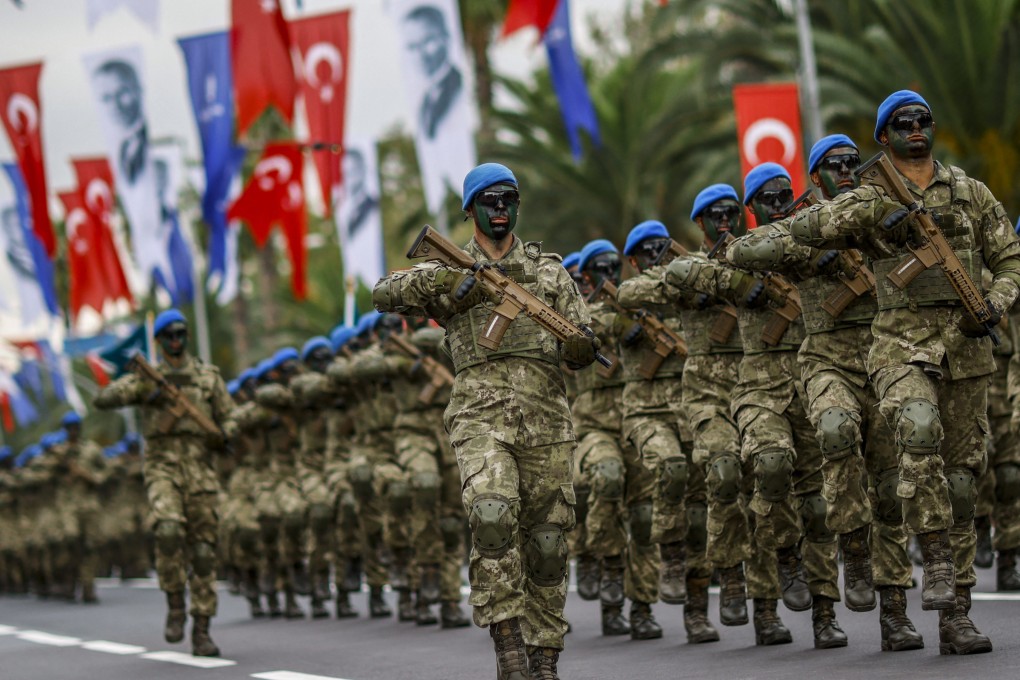 Turkish soldiers march in a military parade in Istanbul last August. Photo: AFP