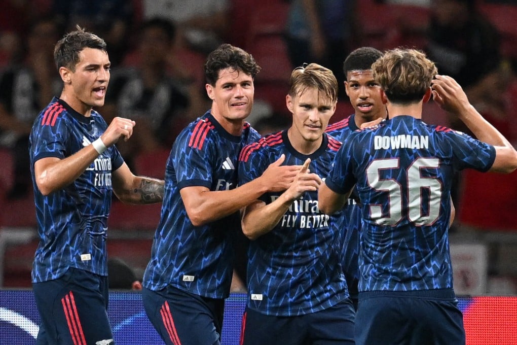 Arsenal players celebrate a goal during their pre-season clash with Newcastle United in Singapore, before their arrival in Hong Kong. Photo: Reuters