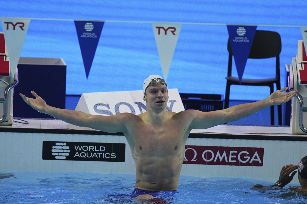 Leon Marchand celebrates his record at the World Aquatics Championships in Singapore on Wednesday. Photo: AP