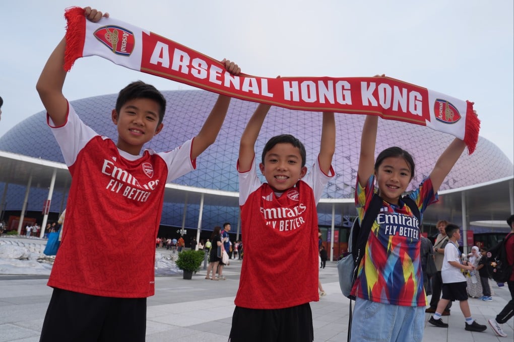 Young fans of Arsenal arrive at Kai Tak Stadium before the open training session. Photo: Elson Li