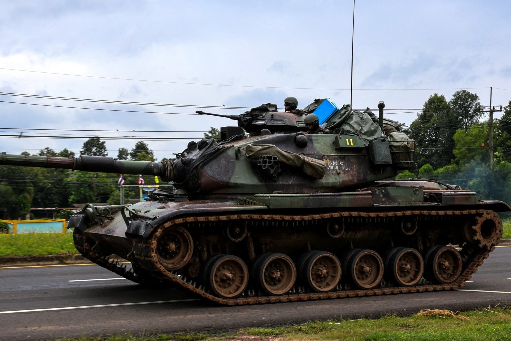A Thai tank drives towards the Thailand-Cambodia border in Sisaket province on Monday. Photo: Reuters