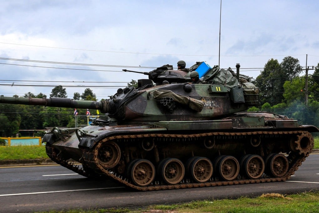 A Thai tank drives towards the Thailand-Cambodia border in Sisaket province on Monday. Photo: Reuters