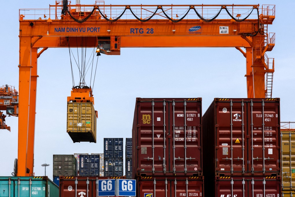 A container is loaded onto a cargo ship while docked at Hai Phong port, in Vietnam, in April. Photo: Reuters