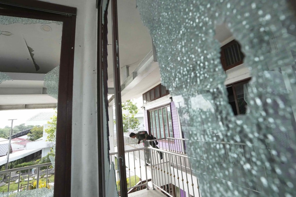 A Thai soldier inspects damage at a hospital caused by the recent fighting. Photo: AP