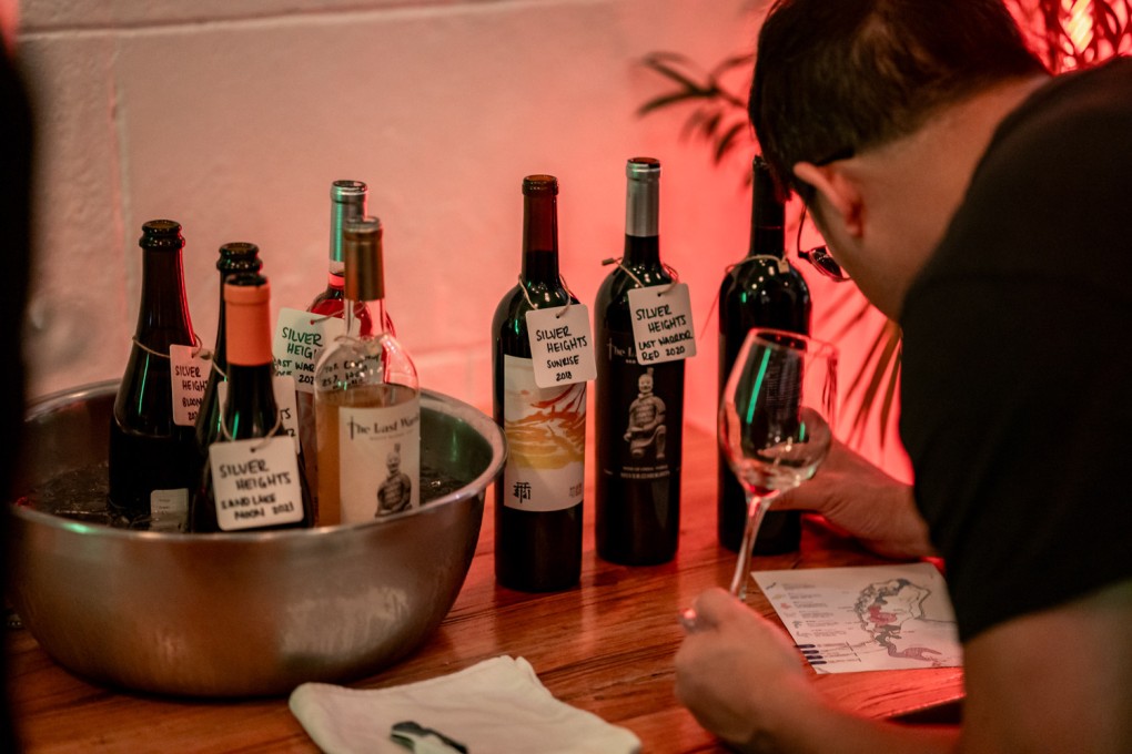 A guest at a China Wine Club event samples wine from the Ningxia region. The club’s founder Camden Hauge aims to “bring the wildest, brightest, and best of modern Chinese winemaking to the US”. Photo: Graeme Kennedy