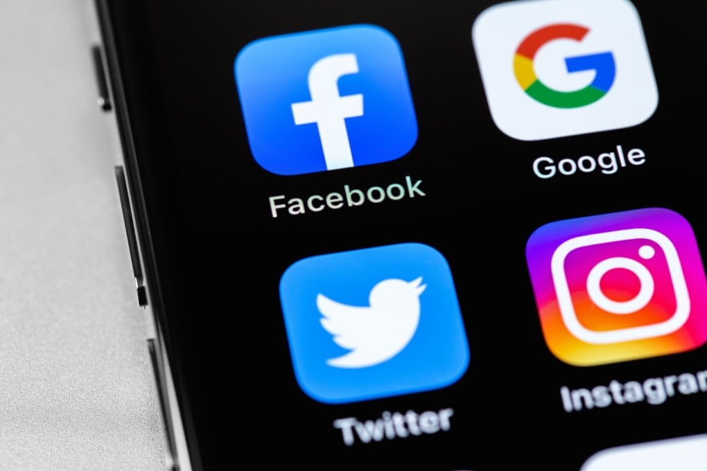 Social media icon apps on a mobile phone. Over the years, Malaysia has progressively imposed stricter laws on social media. Photo: Shutterstock