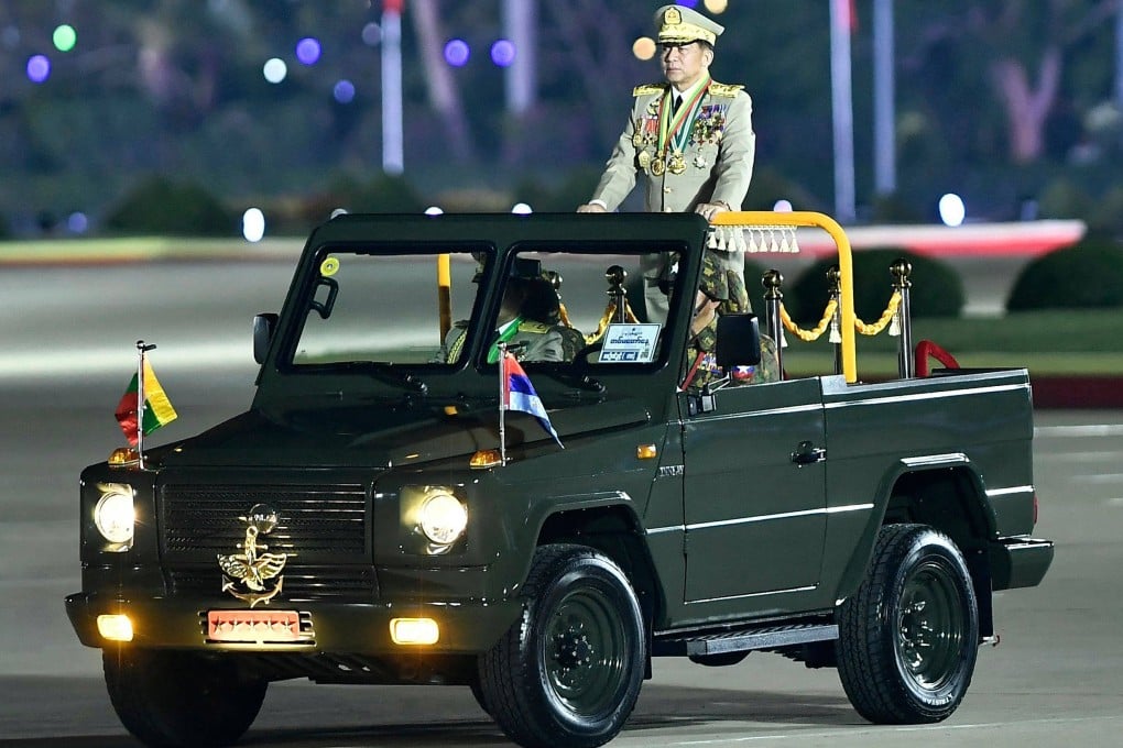 Myanmar’s junta chief military Min Aung Hlaing arrives at a ceremony in Naypyidaw last March. Analysts predict he will keep a role as either president or armed forces chief. Photo: AFP