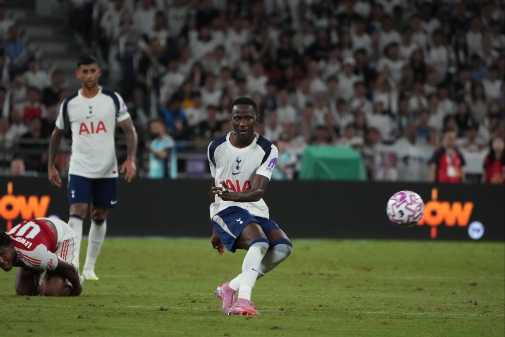Tottenham’s Pape Matar Sarr shoots to score the winner against Arsenal at Kai Tak Stadium. Photo: Sam Tsang