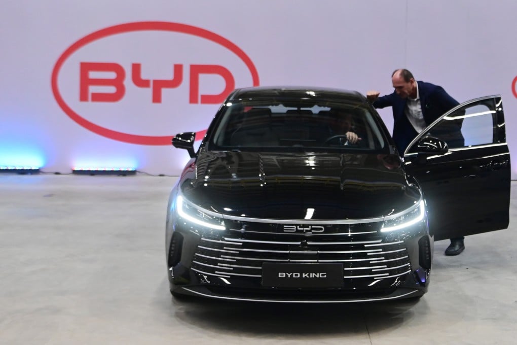 Guests inspect a BYD vehicle on display in Camacari, Brazil on July 1 as the Chinese automaker held a ceremony to mark its first passenger vehicle assembled at its factory there. Photo: Xinhua