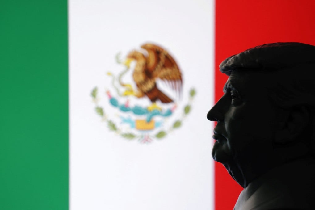 A 3D-printed miniature model of US President Donald Trump and the Mexico flag. Photo: Reuters