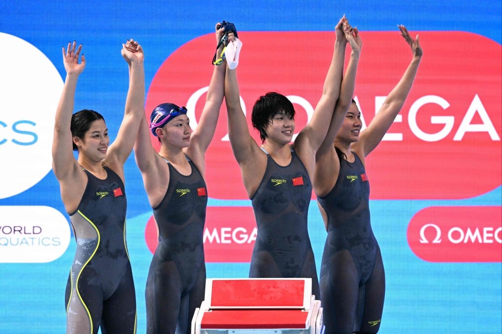 China’s women (from left) Liu Yaxin, Yu Yiting, Li Bingjie, and Yang Peiqi celebrate after finishing third place in the final of the women’s 4x200m freestyle relay. Photo: AFP
