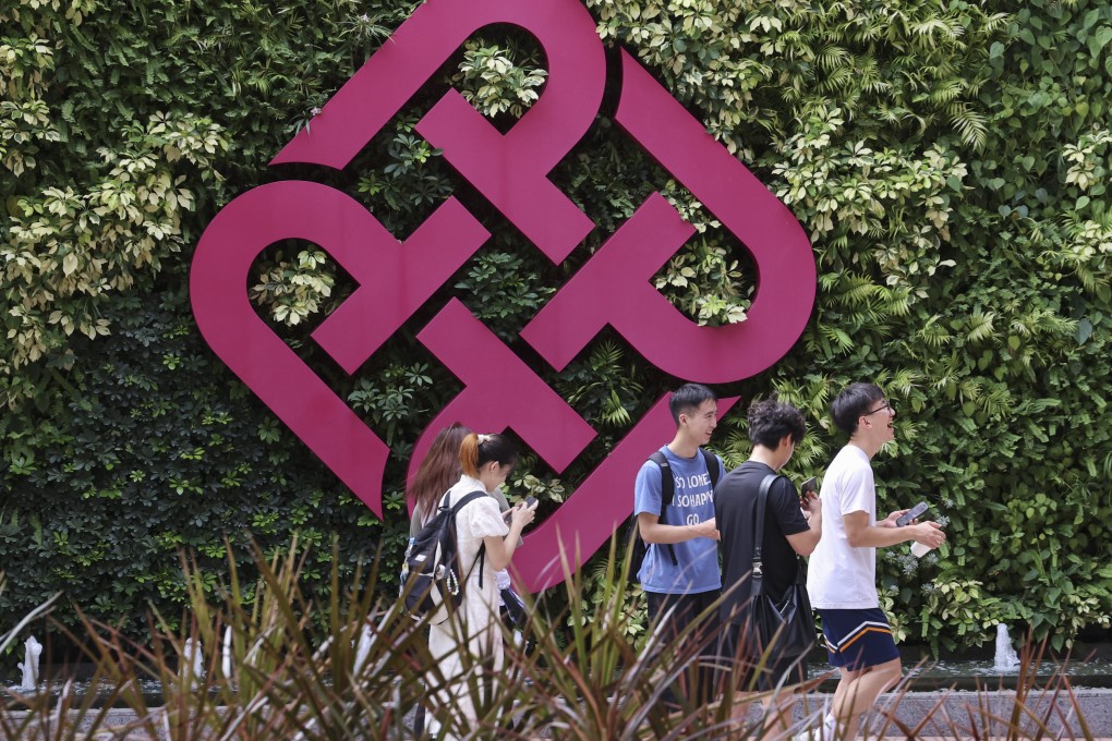 Students walking through Polytechnic University in Hung Hom on July 31. Children of non-local talent will be required to reside in Hong Kong for at least two years to become eligible for local students’ benefits at publicly funded tertiary education institutions starting in the 2027-28 academic year, as part of the government’s efforts to prevent abuse. Photo: Jelly Tse