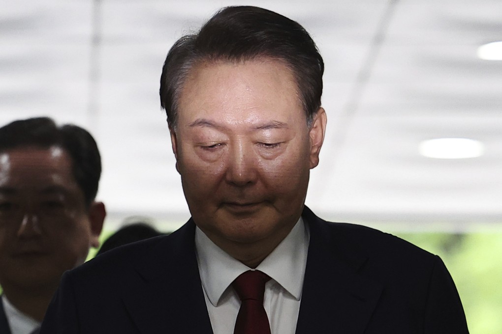 Former South Korean president Yoon Suk-yeol arrives for a hearing to review his arrest warrant on July 9. Photo: AP