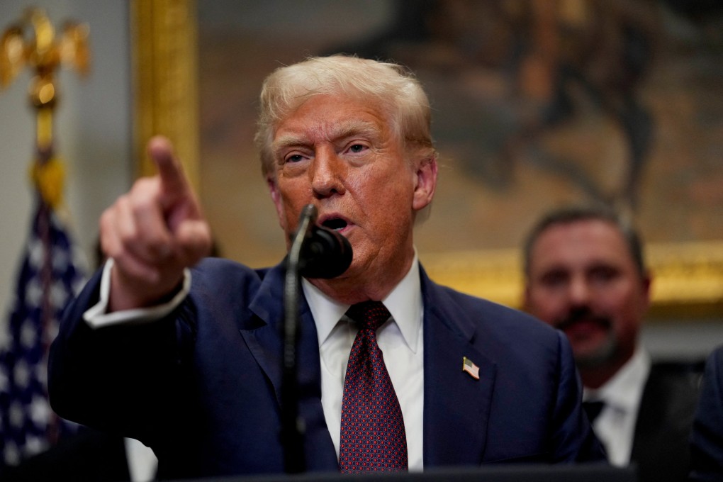 US President Donald Trump points a finger as he delivers remarks in the Roosevelt Room at the White House on Thursday. Photo: Reuters