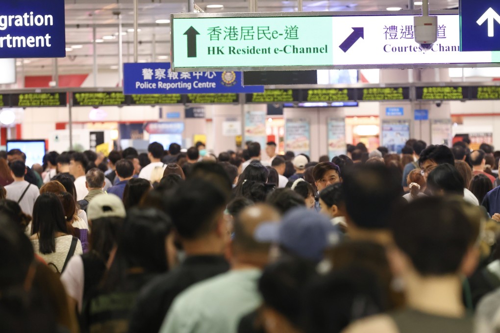 People head into Shenzhen via the Lok Ma Chau border crossing point on April 12. Photo: Dickson Lee