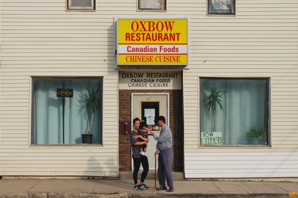 Sons & Daughters creator Suyin Looui (left) with her daughter and father Steffan in front of the Chinese-Canadian cafe he worked in growing up. Looui’s project tells stories of Chinese immigrants in Canada and their experiences in such cafes and restaurants. Photo: Suyin Looui