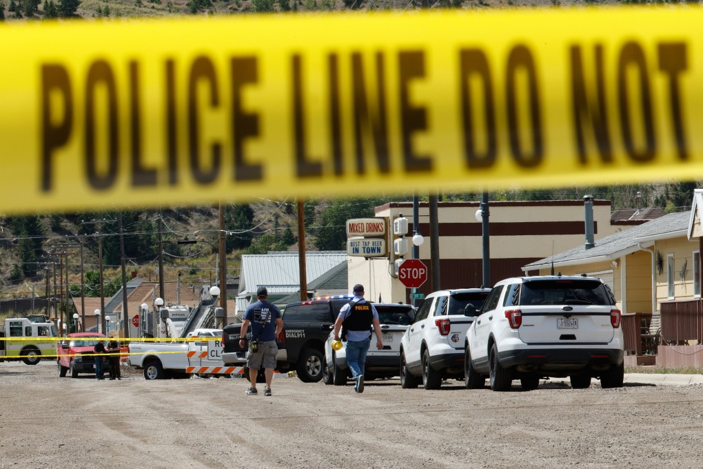 Police and other emergency personnel are seen after a shooting in Anaconda, Montana, on Friday. Photo: The Montana Standard via AP