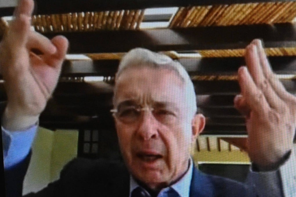 A screen grab from a live broadcast shows Colombian former president Alvaro Uribe gesturing during his sentencing hearing in Bogotá on Friday. Photo: Juzgados Especializados de Paloquemao via AFP