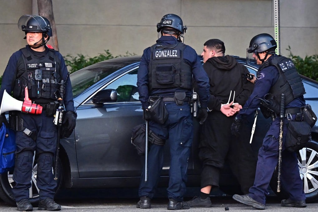 Police make an arrest during a protest in response to federal immigration operations in Los Angeles in June. Photo: via AFP