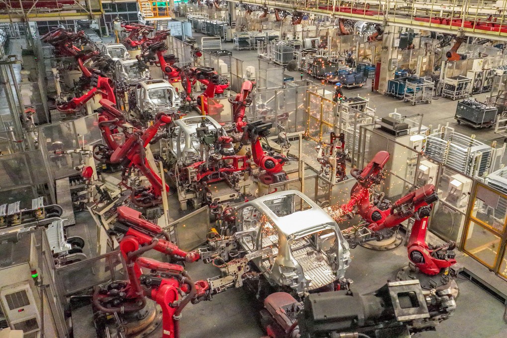 Robotic arms work at an intelligent factory of  Leapmotor in Jinhua, Zhejiang province, on July 16, 2025. Photo: VCG via Getty Images