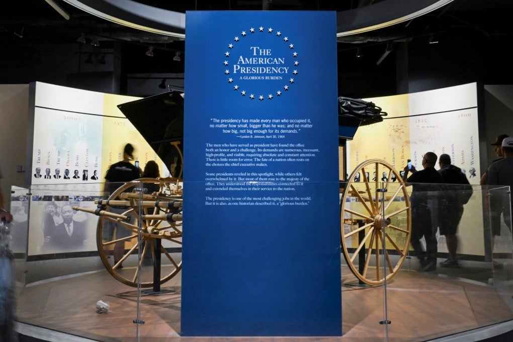 Visitors walk past a sign for “The American Presidency: A Glorious Burden” exhibition inside the Smithsonian’s National Museum of American History in Washington on Saturday. Photo: Reuters