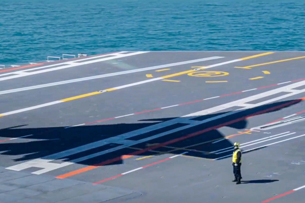 A shadow cast on the Fujian’s deck by an airborne J-15T ends a short segment aired as part of five-episode CCTV military series Forging Ahead. Photo: CCTV
